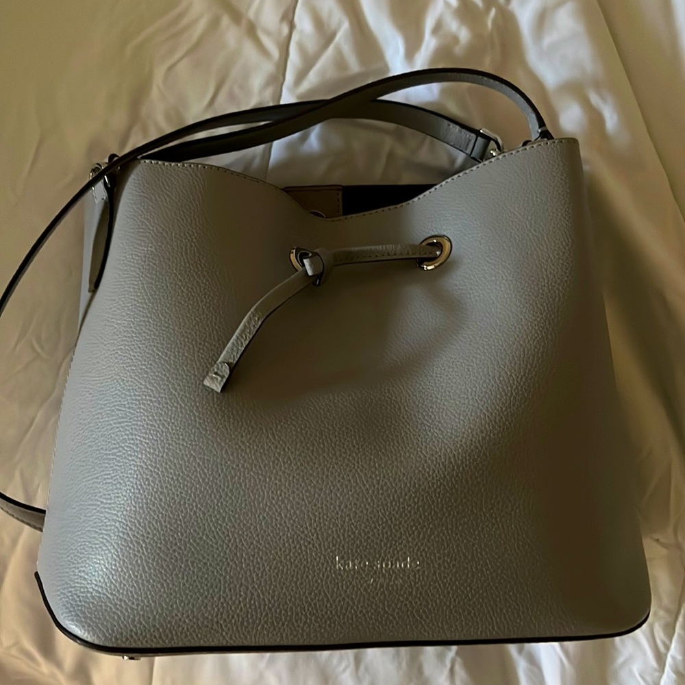 Kate Spade purse (never used before comes with stuffing paper inside)